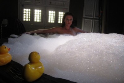 Amanda Tapping in bubbly Space Milkshake tub