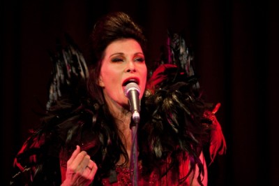 Gorgeous and gifted Jane Badler sings on stage